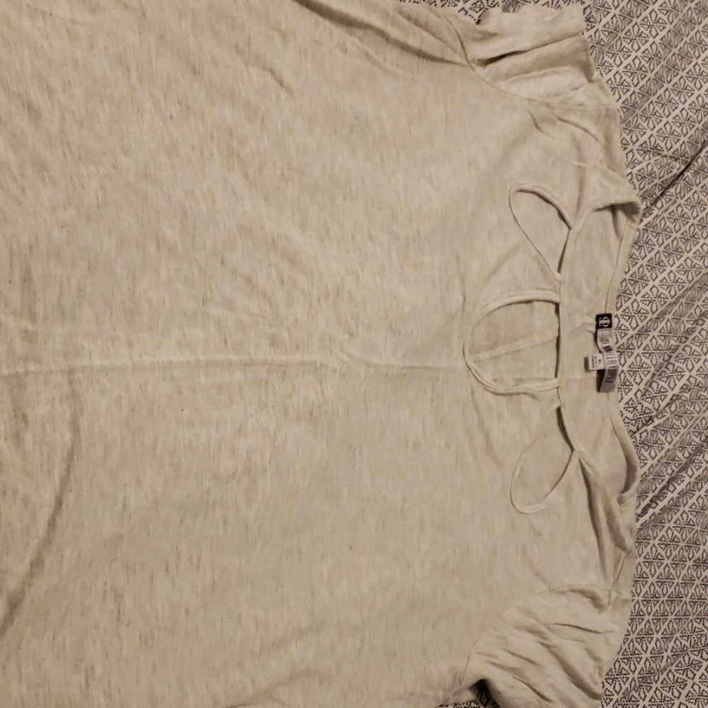 Cream colored tee shirt